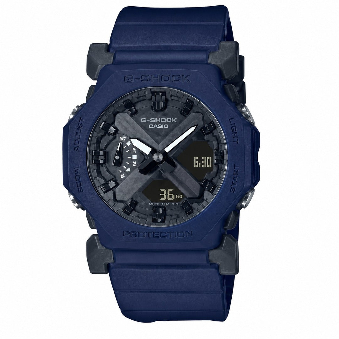 A Casio G-Shock analog-digital watch with a dark blue resin strap and case, featuring a textured dark gray and black dial with a digital display.