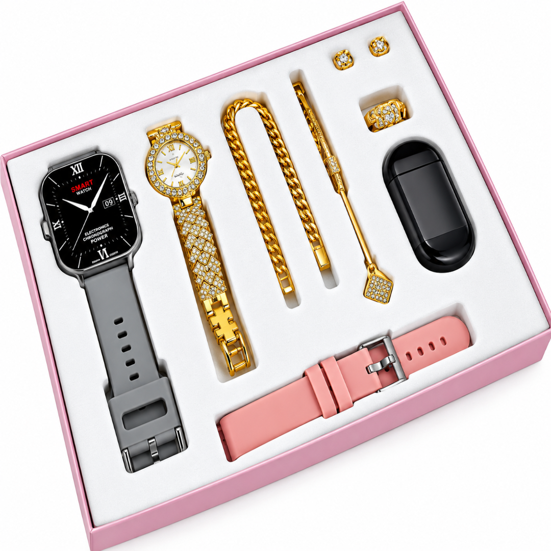 A luxury watch and accessory gift set in a pink box, featuring a smartwatch with a gray strap, a gold watch with crystal embellishments, a gold chain, a gold spoon, a black earbud case, and a pink silicone watch strap.