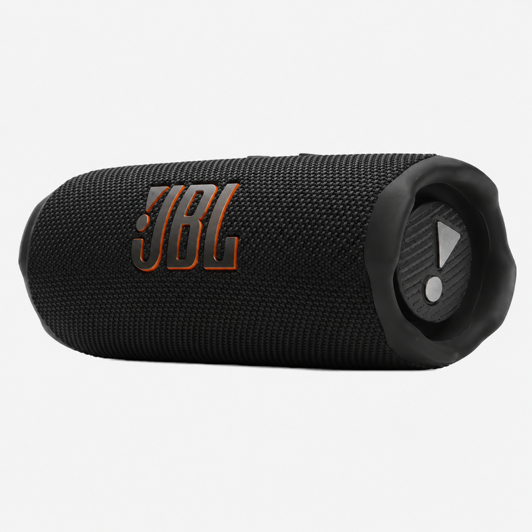 A JBL portable speaker in black with a textured fabric cover and a prominent orange-outlined JBL logo on the side, shown against a plain light gray background.