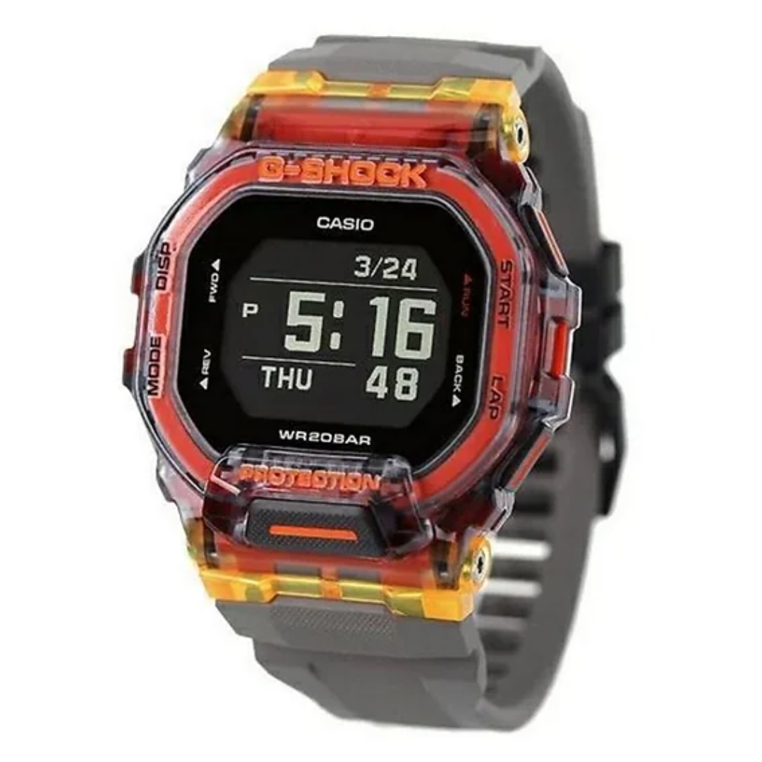 Casio G-Shock digital watch with red and orange accents on a white background