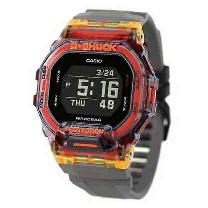 Casio G-Shock digital watch with red and orange accents on a white background