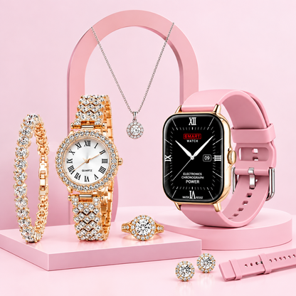 A coordinated jewelry and watch display on pink pedestals: a pink smartwatch with a black screen, a gold-tone watch with a white dial and crystal-encrusted band, a pink bracelet, a ring, earrings, and a necklace, all arranged against a soft pink background.